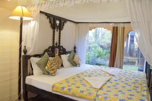 фото отеля Leela Cottages