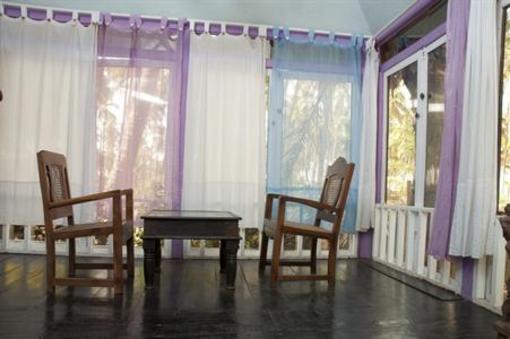 фото отеля Leela Cottages