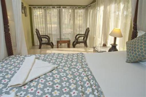 фото отеля Leela Cottages