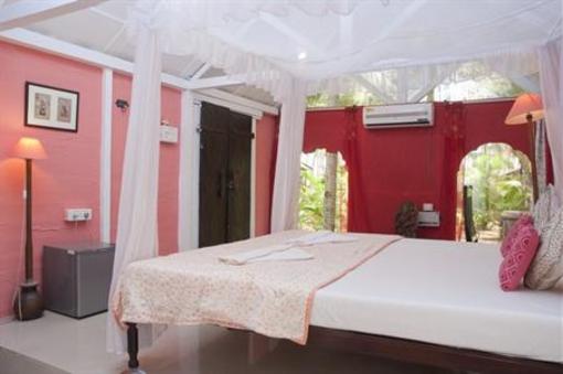 фото отеля Leela Cottages