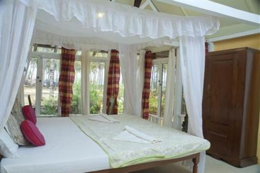 фото отеля Leela Cottages