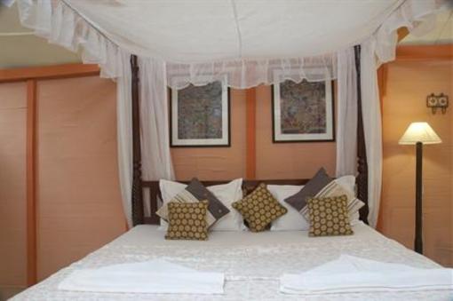 фото отеля Leela Cottages