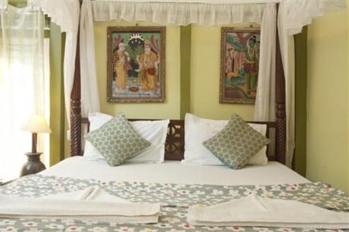 фото отеля Leela Cottages