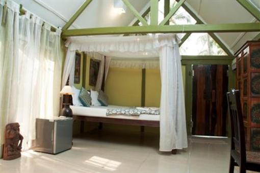 фото отеля Leela Cottages