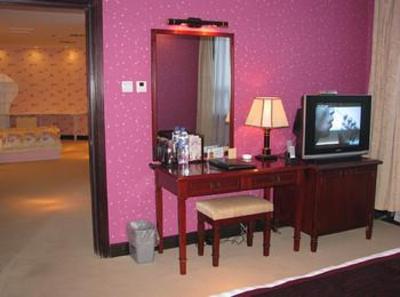 фото отеля Xinmao Tiancai Hotel