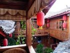 фото отеля Bashilai Inn Lijiang Bayi