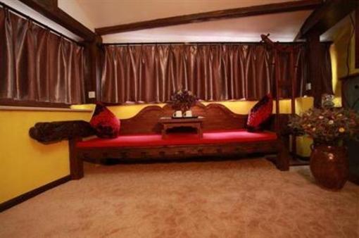 фото отеля Lijiang Na Yunqi Valley Inn