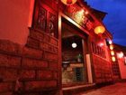 фото отеля Lijiang Na Yunqi Valley Inn