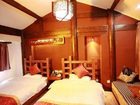 фото отеля Lijiang Na Yunqi Valley Inn