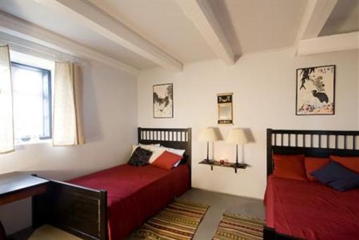 фото отеля Mickels Guest Cottages