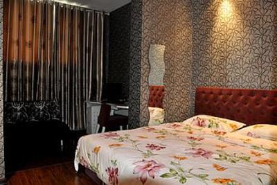 фото отеля Hyperspace Boutique Hotel Qingdao Lijin Road