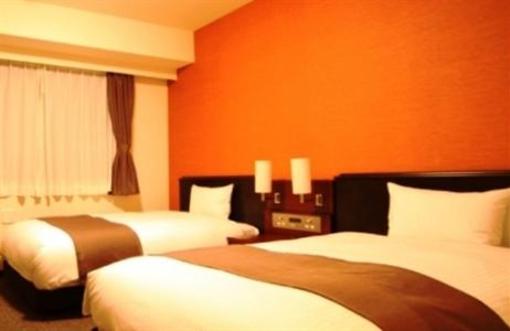 фото отеля Apa Hotel Keikyukamata Ekimae