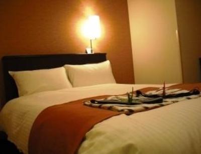 фото отеля Apa Hotel Keikyukamata Ekimae