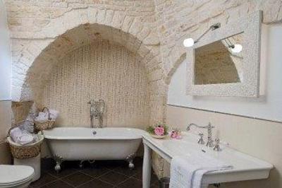 фото отеля Le Alcove Luxury Hotel Nei Trulli