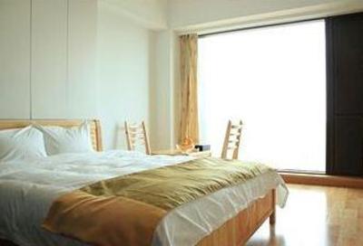 фото отеля Qingdao Tujia Vacation Rentals Tiantai Finance Square