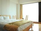 фото отеля Qingdao Tujia Vacation Rentals Tiantai Finance Square