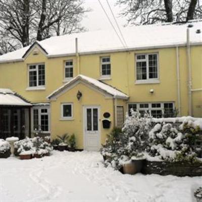 фото отеля Coach House Cottage