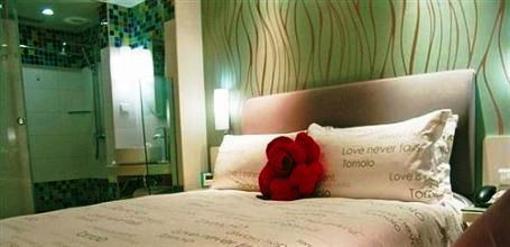 фото отеля Yangzijiang Mei Le Hotel Guangbutun