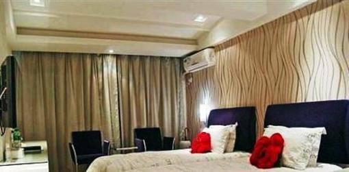 фото отеля Yangzijiang Mei Le Hotel Guangbutun