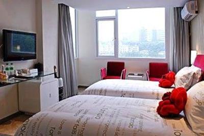 фото отеля Yangzijiang Mei Le Hotel Guangbutun