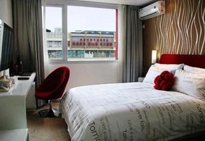 фото отеля Yangzijiang Mei Le Hotel Guangbutun