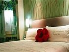 фото отеля Yangzijiang Mei Le Hotel Guangbutun