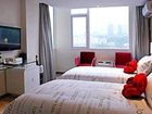 фото отеля Yangzijiang Mei Le Hotel Guangbutun