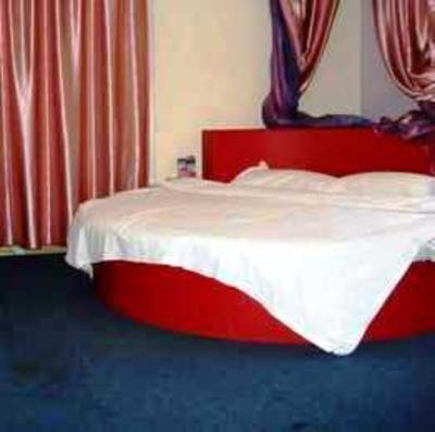 фото отеля Kuaile Yizhan Business Hotel