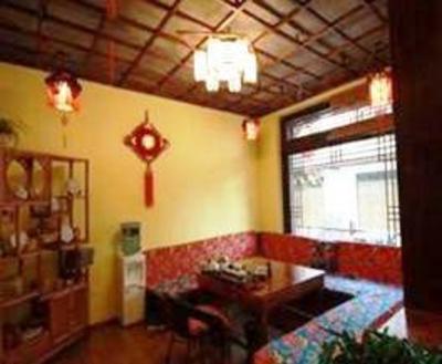 фото отеля Lijiang Hong Gu Inn