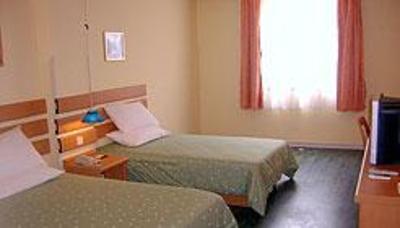 фото отеля Home Inn Haikou Bailong Road