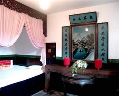 фото отеля Pingyao Dejuyuan Inn