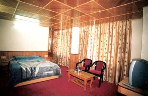 фото отеля Hotel New Adarsh Manali