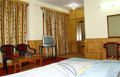 фото отеля Hotel New Adarsh Manali