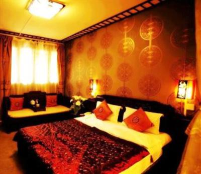 фото отеля Xingfu Inn Lijiang