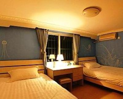 фото отеля Xingqinghai Inn