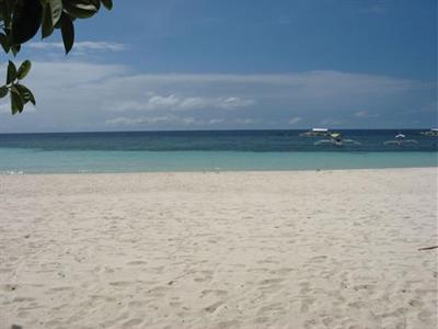 фото отеля Alona Tropical Beach Resort