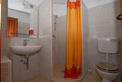 фото отеля Adios Apartman