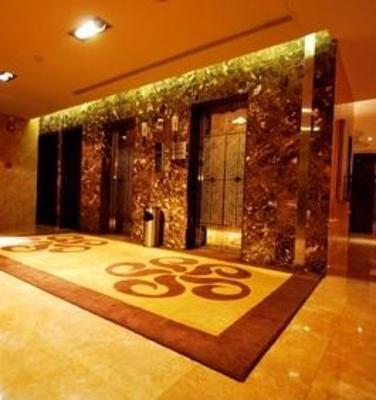фото отеля Peninsula Suites Hotel
