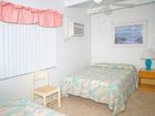 фото отеля Tropical Winds Motel & Cottages