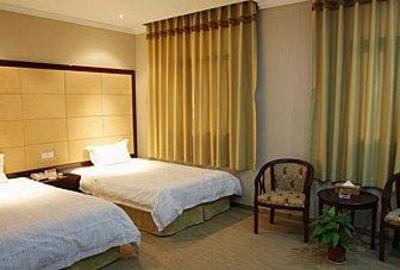 фото отеля Xinhaodu Business Hotel