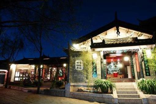 фото отеля Lijiang Zheng Fu Cao Tang Inn Shu Xiang Mansion