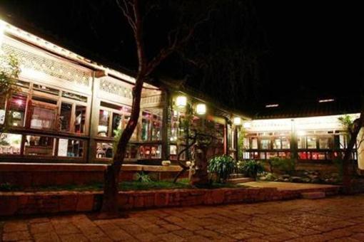 фото отеля Lijiang Zheng Fu Cao Tang Inn Shu Xiang Mansion
