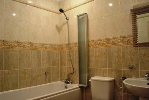 фото отеля Town Or Country Sirocco Apartment