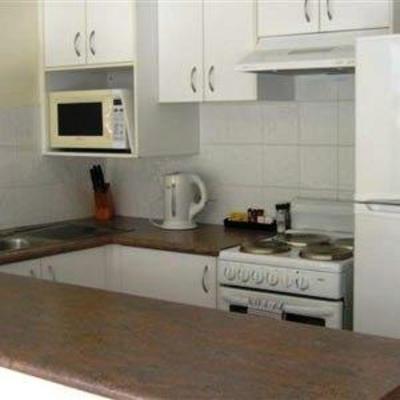 фото отеля Beach House Holiday Apartments