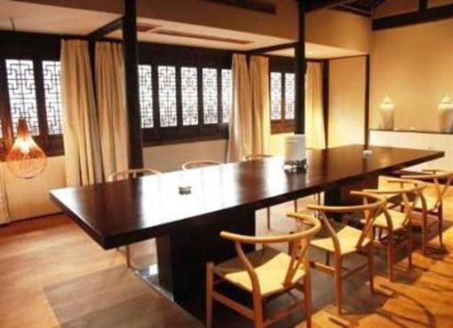 фото отеля Blossom Hill Inn Zhouzhuang Seasonland