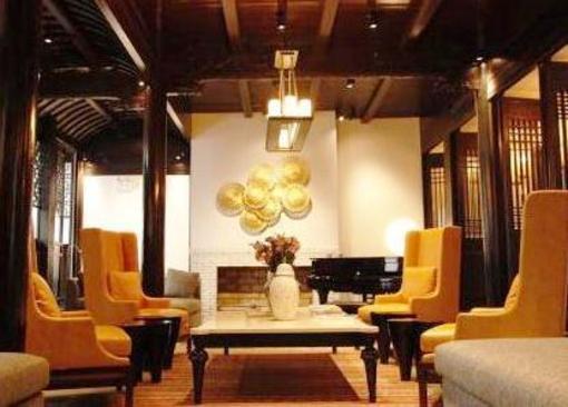 фото отеля Blossom Hill Inn Zhouzhuang Seasonland