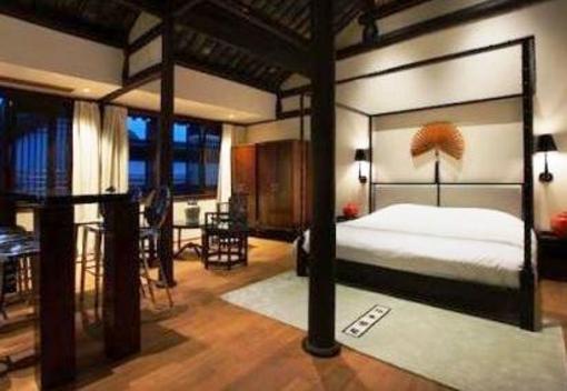 фото отеля Blossom Hill Inn Zhouzhuang Seasonland
