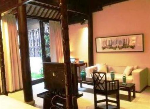 фото отеля Blossom Hill Inn Zhouzhuang Seasonland