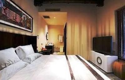 фото отеля Blossom Hill Inn Zhouzhuang Seasonland