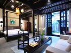 фото отеля Blossom Hill Inn Zhouzhuang Seasonland